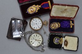 A SILVER POCKET WATCH AND CHAIN, and gold plated pocket watch, three enamel badges (oddfellows)