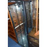 A MODERN GLAZED TWO DOOR DISPLAY CABINET