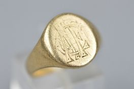 A 9CT SIGNET RING, and a 1951 Festival of Britain coin, ring size Q, approximate weight 7.7 grams (
