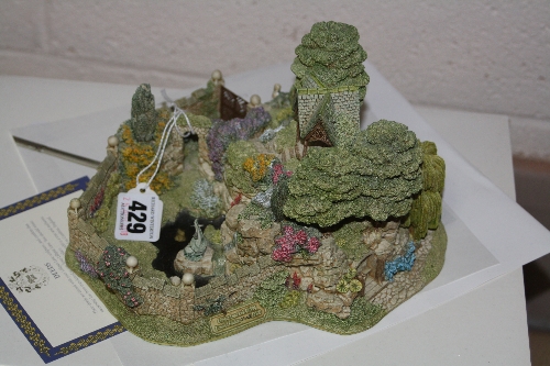 A BOXED LIMITED EDITION LILLIPUT LANE SCULPTURE, modelled as 'Leonora's Secret' No.2448/2500 (with