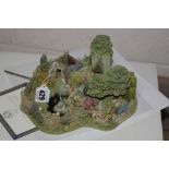 A BOXED LIMITED EDITION LILLIPUT LANE SCULPTURE, modelled as 'Leonora's Secret' No.2448/2500 (with