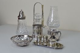 A BOX OF MISCELLANEOUS PLATED WARE, including lamp and castor