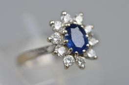 AN 18CT SAPPHIRE AND DIAMOND RING, ring size K, approximate weight 4.1 grams
