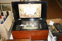 A LATE 19TH CENTURY SWISS TABLE TOP MUSIC BOX, the 15.3cm/6 inch cylinder playing eight airs on