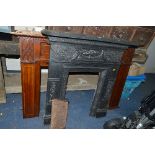 A CAST IRON FIRE SURROUND, and an Edwardian overmantel mirror frame (no mirror) (2)