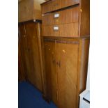 AN OAK THREE PIECE BEDROOM SUITE, comprising of two wardrobes and a dressing table, together with