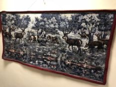 A 20TH CENTURY WALL TAPESTRY, of a pack of hounds hunting deer, approximate width 167cm