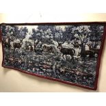 A 20TH CENTURY WALL TAPESTRY, of a pack of hounds hunting deer, approximate width 167cm