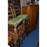 AN OAK DRAW LEAF TABLE, with four chairs and an oak two door gents wardrobe with two drawers