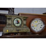 A GREEN PAINTED MANTEL CLOCK, with brass moulding, enamel dial and Arabic numerals, together with