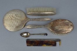 A FOUR PIECE SILVER BRUSH SET, and a teaspoon