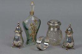 A PAIR OF SILVER SALTS, silver napkin ring, a silver topped perfume bottle (5)