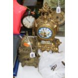 A BRASS LANTERN CLOCK, with key, height 22cm, together with a gilt metal and porcelain mantel