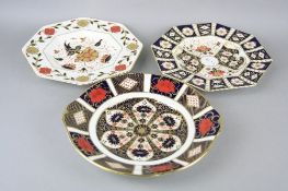 THREE ROYAL CROWN DERBY PLATES, to include '1128' (seconds) sandwich plate, diameter approximately