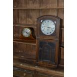 A MID 20TH CENTURY OAK WALL CLOCK, and a mantle clock (2)