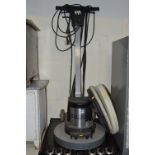 A NUMATIC NMD 1000S FLOOR POLISHER WITH SPARE HEADS