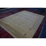 A LARGE WOOLLEN CARPET SQUARE, by Van Den Brink & Campman, Holland, oatmeal ground, approximate