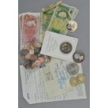 A BAG OF ENGLISH NOTES AND COINS
