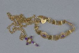 A MODERN AMETHYST AND DIAMOND 9CT GOLD CROSS AND CHAIN, pendant set with four pear shaped amethysts,