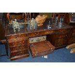 A LARGE BEVON FUNNEL MAHOGANY PEDESTAL DESK, with triple chocolate tooled leather inlay top, eight