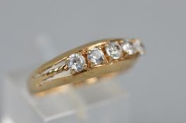 A 9CT RING SET WITH FIVE CIBIC ZIRCONIAS, ring size Q, approximate weight 3.2 grams