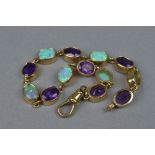 A MODERN 9CT GOLD AMETHYST AND SYNTHETIC OPAL BRACELET, oval gemstones measuring approximately 8.0mm