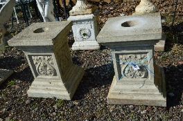 A PAIR OF COMPOSITE GARDEN COLUMNS approximate 43cm square in form with Art Noveau detailing to each