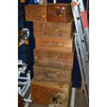SEVEN VINTAGE WOODEN BOXES, two with lids, all with trade named printed on sides (7)