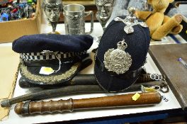 A VICTORIAN TRUNCHEON, another later, Police hats, one with West Midlands Police cap badge the other