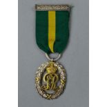 A GEORGE V TERRITORIAL DECORATION, silver and silver gilt, hallmarked to reverse