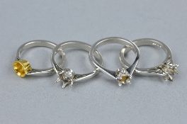 FOUR PLATINUM RING MOUNTS, ring sizes L1/2, M, M, O, approximate weight 17.5 grams
