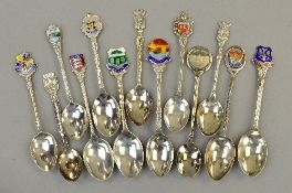 A SELECTION OF THIRTEEN SILVER AND PLATED COMMEMORATIVE TEASPOONS