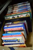 A BOX OF BOOKS RELATING TO COINS, STAMPS, MEDALS ETC