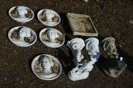 ELEVEN COMPOSITE GARDEN ITEMS INCLUDING A FIGURE OF A FROG, man with horse, five plaques, a bird