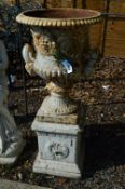A CAST IRON GARDEN URN ON STAND, approximately 100cm high