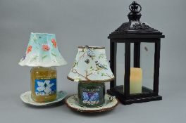 TWO YANKEE CANDLE HOLDERS, both containing a used candle 'Ocean Blossom' and 'Garden Sweet Pea'