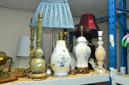 EIGHT VARIOUS TABLE LAMP BASES INCLUDING A POOLE POTTERY EXAMPLE, a clear glass example with blue