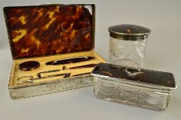 A CASED SILVER MANICURE SET AND TWO COSMETIC JARS