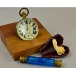 A GLOBE WATCH No 925145 (damage to enamel), together with a scent bottle, cheroot holder (3)