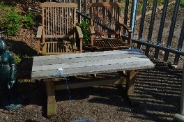 TWO FOLDING GARDEN CHAIRS AND A RUSTIC GARDEN COFFEE TABLE (2)