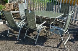 A METALLIC GREEN METAL AND GLASS GARDEN TABLE WITH SIX FOLDING ARMCHAIRS, chairs badged LG outdoors,