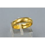 A 22CT BAND, ring size L, approximate weight 6.4 grams