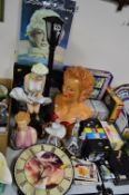 MARALYN MONROE, a collection of ornaments, plaster bust, table lamp, wall clocks, DVD's, pictures,