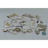 A MIXED BAG OF 925 SILVER, including rings, bangles, chains, etc, approximate weight 157.5 grams