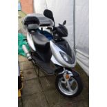 A 2010 JINLUN 125cc MOTOR SCOOTER REG NO VX10 LXT, mileage shown 0690 V5C present