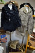 A BLACK FUR JACKET, a 3/4 fur coat, three other coats and various fur stoles etc