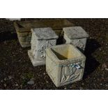 TWO COMPOSITE GARDEN PLANTERS, and two columns (4)