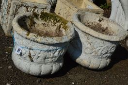 A PAIR OF COMPOSITE GARDEN URN TOPS (no bases), approximately 47cm in diameter x 40cm high