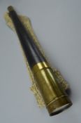A LARGE HAND HELD PERISCOPE, approximately 95cm in length, of brass and leather construction,