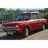 A 1974 HILLMAN IMPRO SUPER IN RED, REG NO XFH 547M, mileage shown 63042, 900cc petrol engine, manual